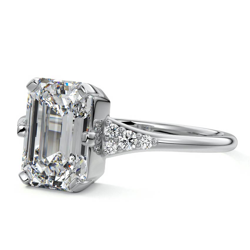 Platinum Emerald Diamond Engagement Ring with Side Stone Accents and Prong Setting
