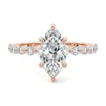 Rose gold Marquise Diamond Hidden Halo Engagement Ring with Side Stones and Prong Setting