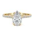 Yellow gold Pear Diamond Engagement Ring with Pavé Band and Hidden Halo