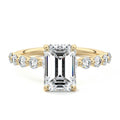 Yellow gold Emerald Diamond Engagement Ring with Round Side Stones and Prong Setting