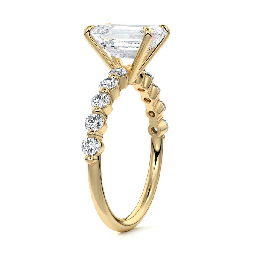 Yellow gold Emerald Diamond Engagement Ring with Round Side Stones and Prong Setting