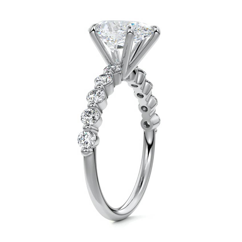 Silver Pear Diamond Engagement Ring with Round Side Stones and Prong Setting