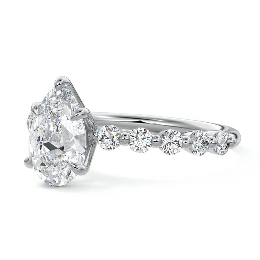 Silver Pear Diamond Engagement Ring with Round Side Stones and Prong Setting