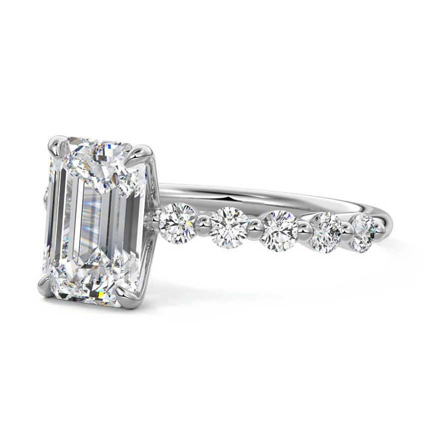 Silver Emerald Diamond Engagement Ring with Round Side Stones and Prong Setting