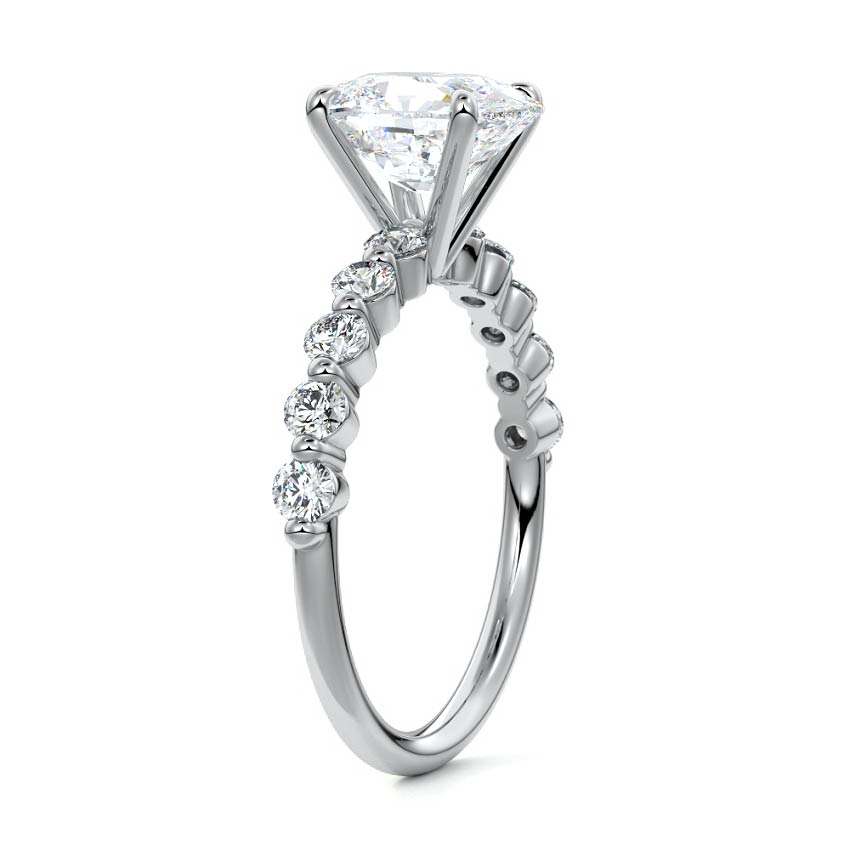 Platinum Cushion Diamond Engagement Ring with Round Side Stones and Prong Setting