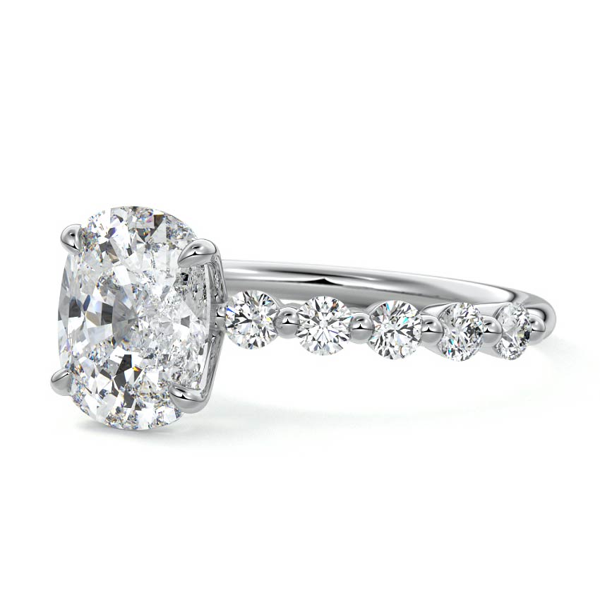 Platinum Cushion Diamond Engagement Ring with Round Side Stones and Prong Setting