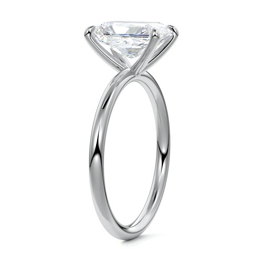 Platinum Radiant Diamond Solitaire Engagement Ring with Twisted Cathedral Setting