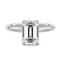 Platinum Emerald Diamond Solitaire Engagement Ring with Twisted Cathedral Setting