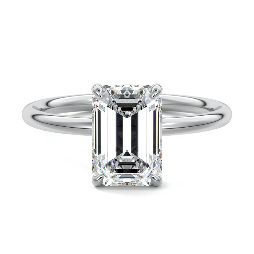 Platinum Emerald Diamond Solitaire Engagement Ring with Twisted Cathedral Setting