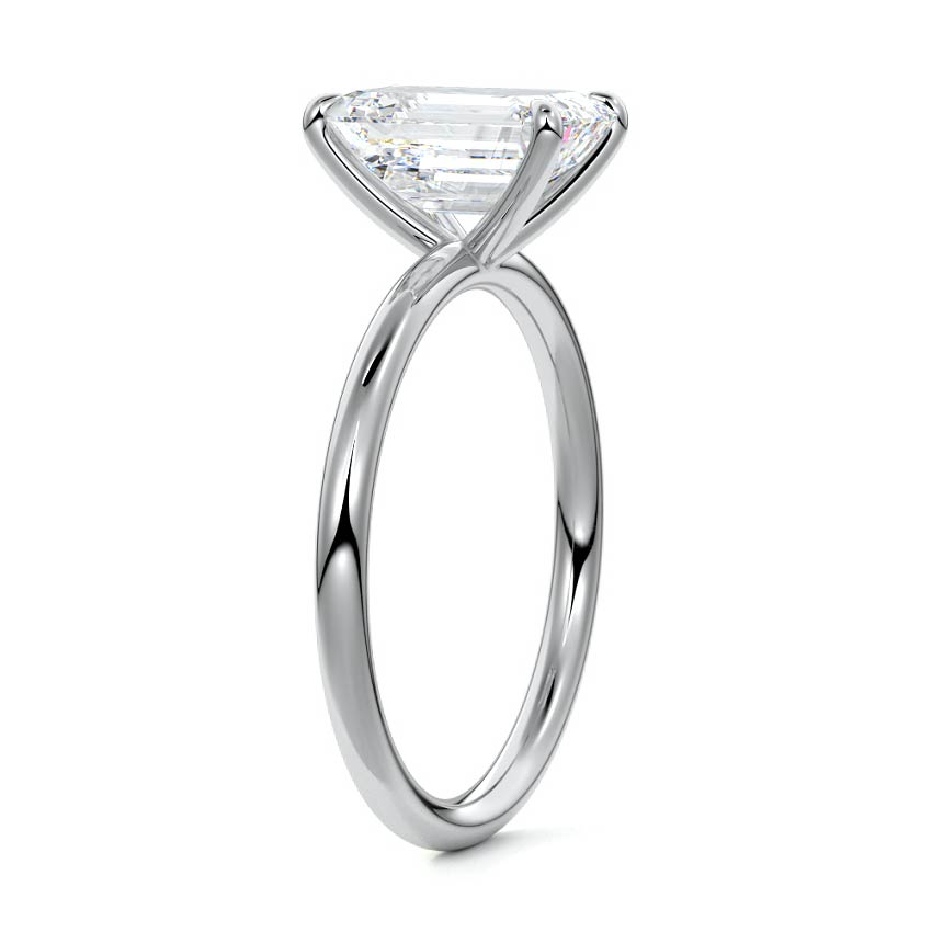 Platinum Emerald Diamond Solitaire Engagement Ring with Twisted Cathedral Setting