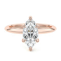Rose gold Marquise Diamond Solitaire Engagement Ring with Sculpted Cathedral Setting