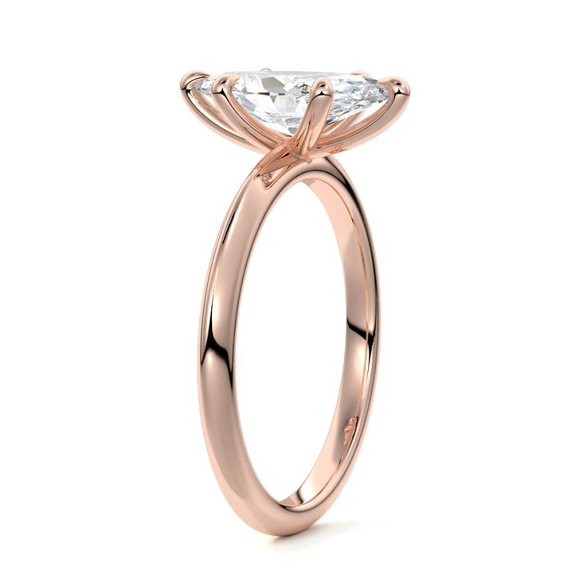 Rose gold Marquise Diamond Solitaire Engagement Ring with Sculpted Cathedral Setting