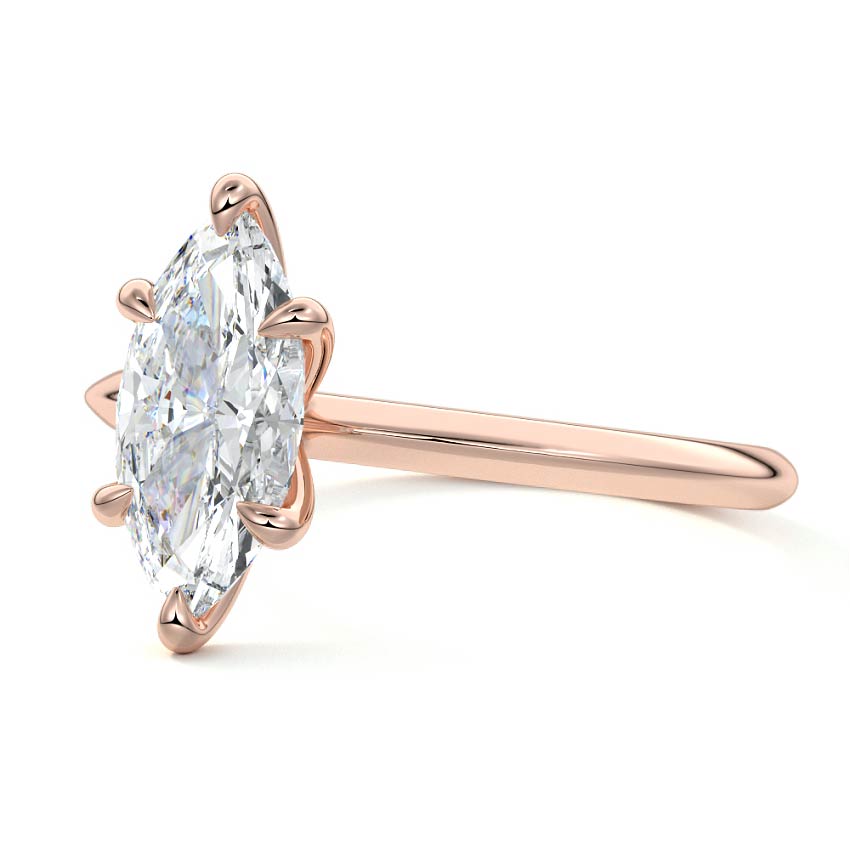 Rose gold Marquise Diamond Solitaire Engagement Ring with Sculpted Cathedral Setting