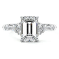Silver Emerald Diamond Engagement Ring with Mixed Shape Side Stones and Prong Setting