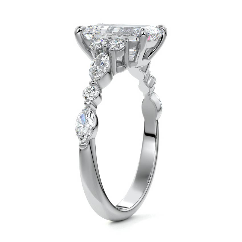 Silver Emerald Diamond Engagement Ring with Mixed Shape Side Stones and Prong Setting