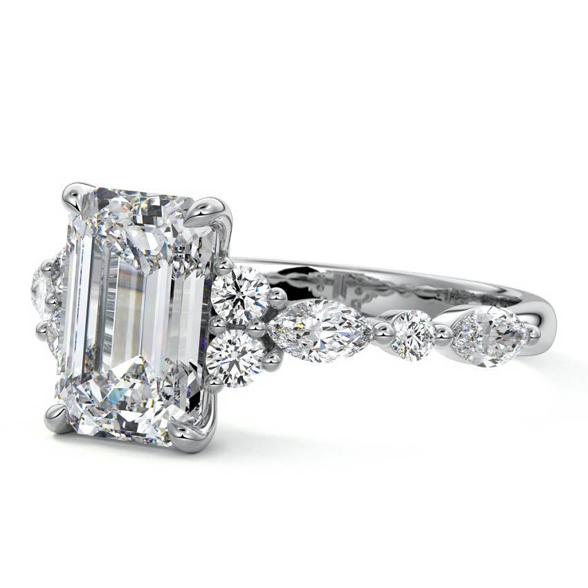 Silver Emerald Diamond Engagement Ring with Mixed Shape Side Stones and Prong Setting