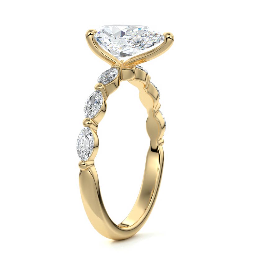 Yellow gold Pear Diamond Side Stone Engagement Ring