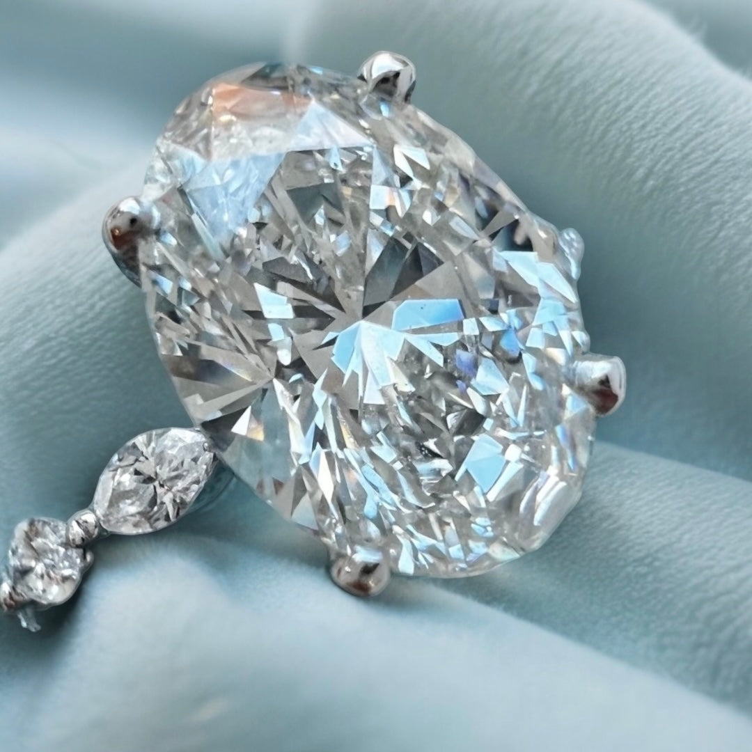 Silver Oval Diamond Side Stone Engagement Ring