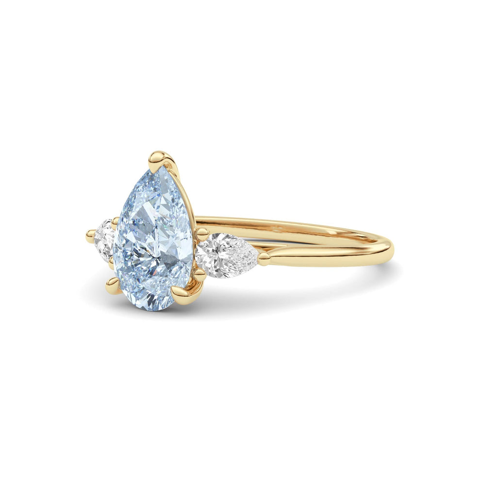 Yellow gold Three-Stone Fancy Blue Pear Cut Diamond Ring with Pear Side Stones
