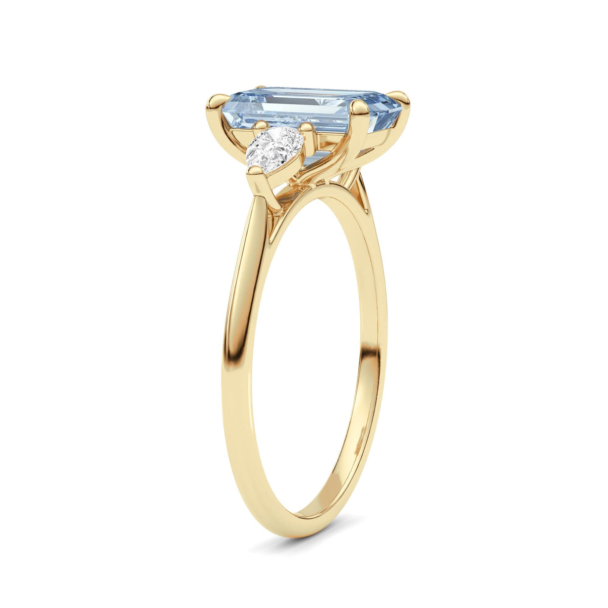Yellow gold Three-Stone Fancy Blue Emerald Cut Diamond Ring with Pear Side Stones