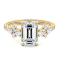 Yellow gold Emerald Solitaire Diamond Engagement Ring with Floral Cluster Side Stones and Pave Band
