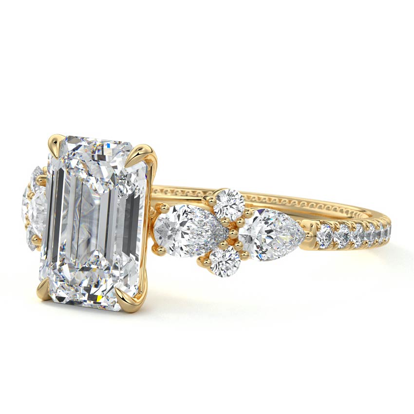 Yellow gold Emerald Solitaire Diamond Engagement Ring with Floral Cluster Side Stones and Pave Band