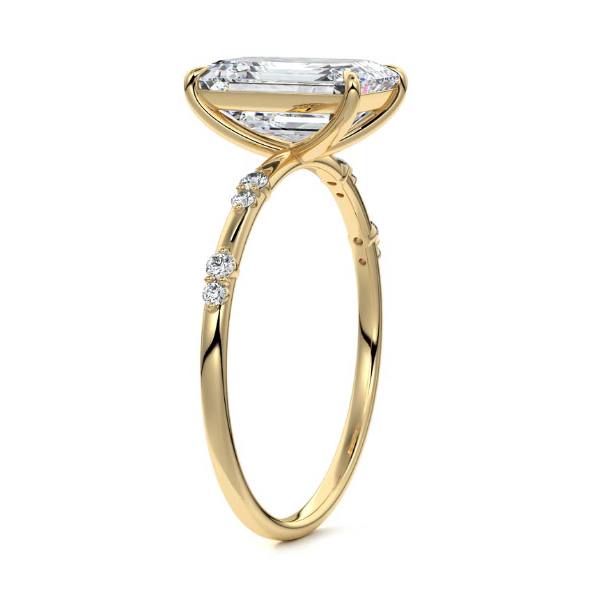 Yellow gold Emerald Diamond Engagement Ring with Minimal Round Side Stones and Prong Setting