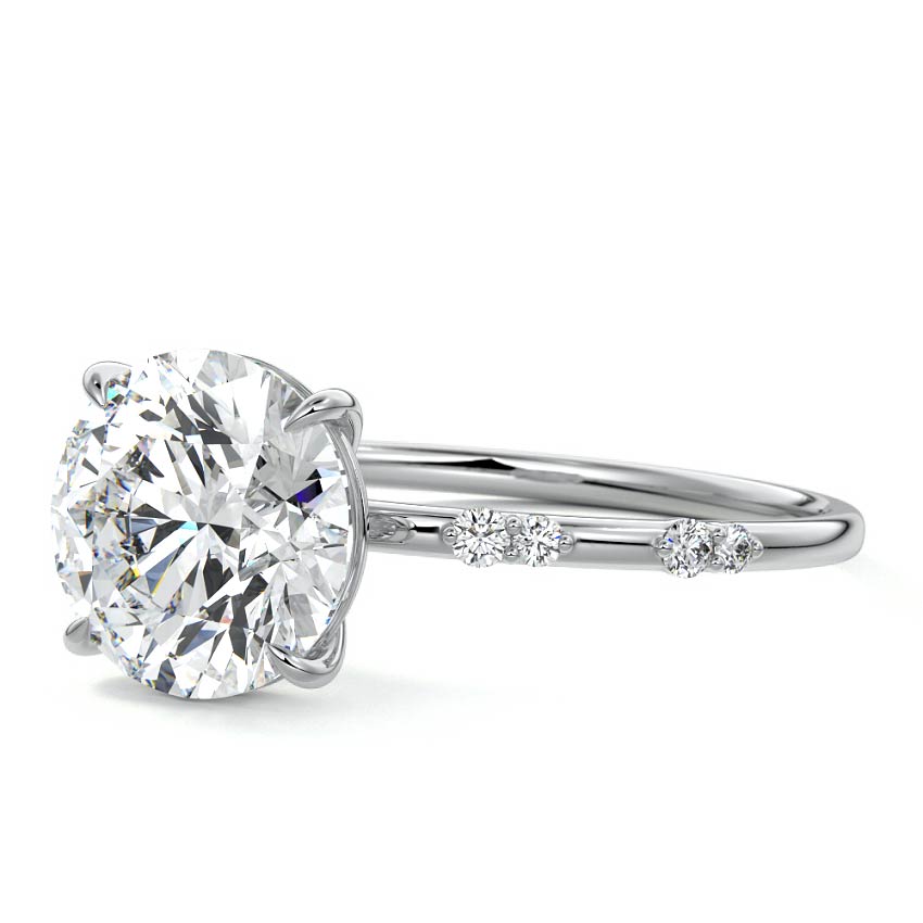 Silver Round Diamond Engagement Ring with Minimal Round Side Stones and Prong Setting