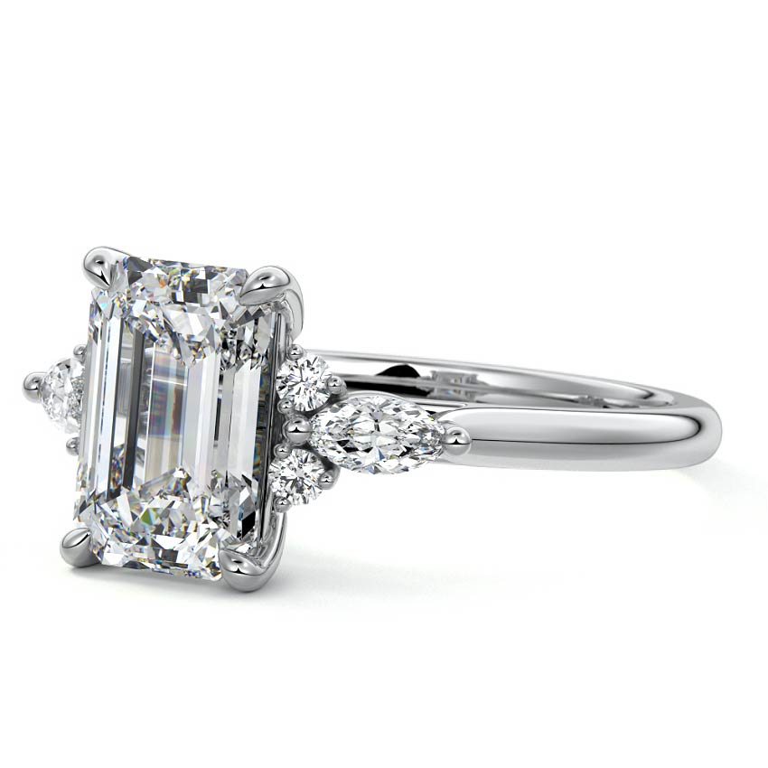 White gold Emerald Diamond Engagement Ring with Marquise and Round Cluster Side Stones