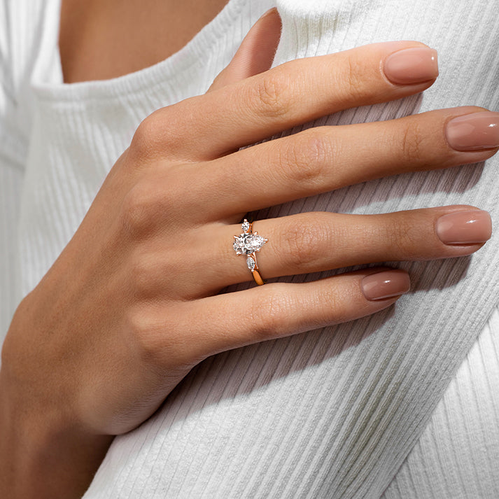 Rose gold Three-Stone Pear Diamond Ring with Marquise Side Stones