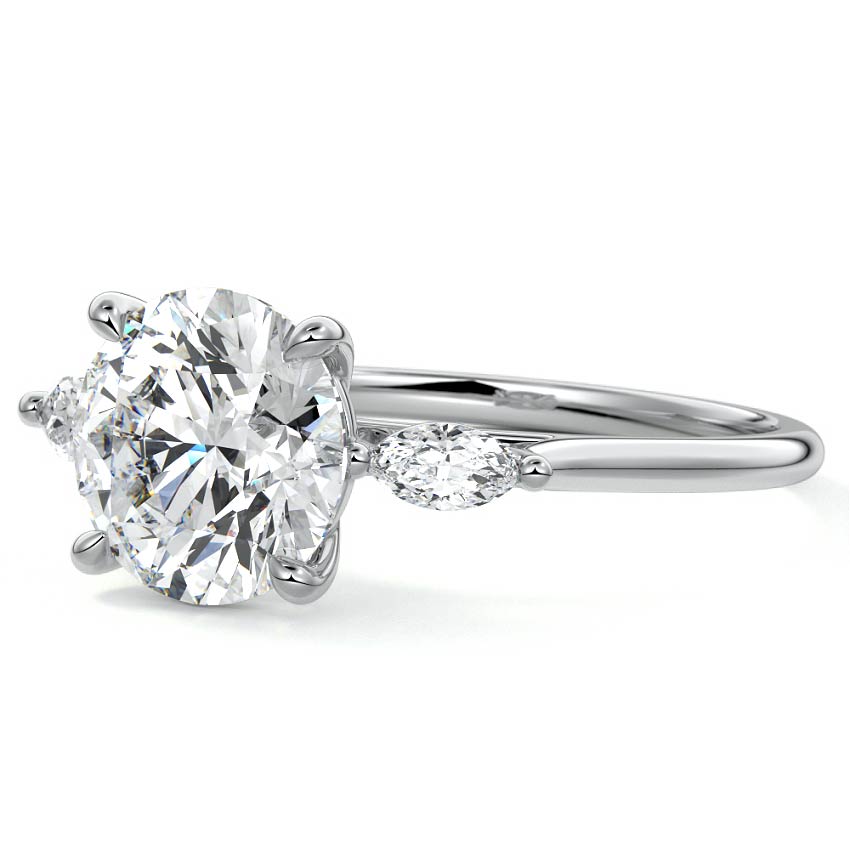 Platinum Three-Stone Round Diamond Ring with Marquise Side Stones