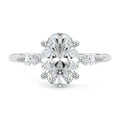 Platinum Three-Stone Oval Diamond Ring with Marquise Side Stones