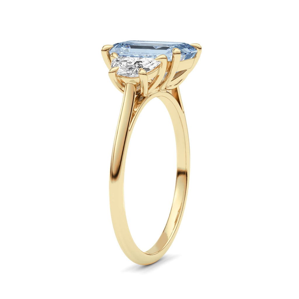 Yellow gold Three-Stone Fancy Blue Emerald Cut Diamond Ring with Half Moon Side Stones
