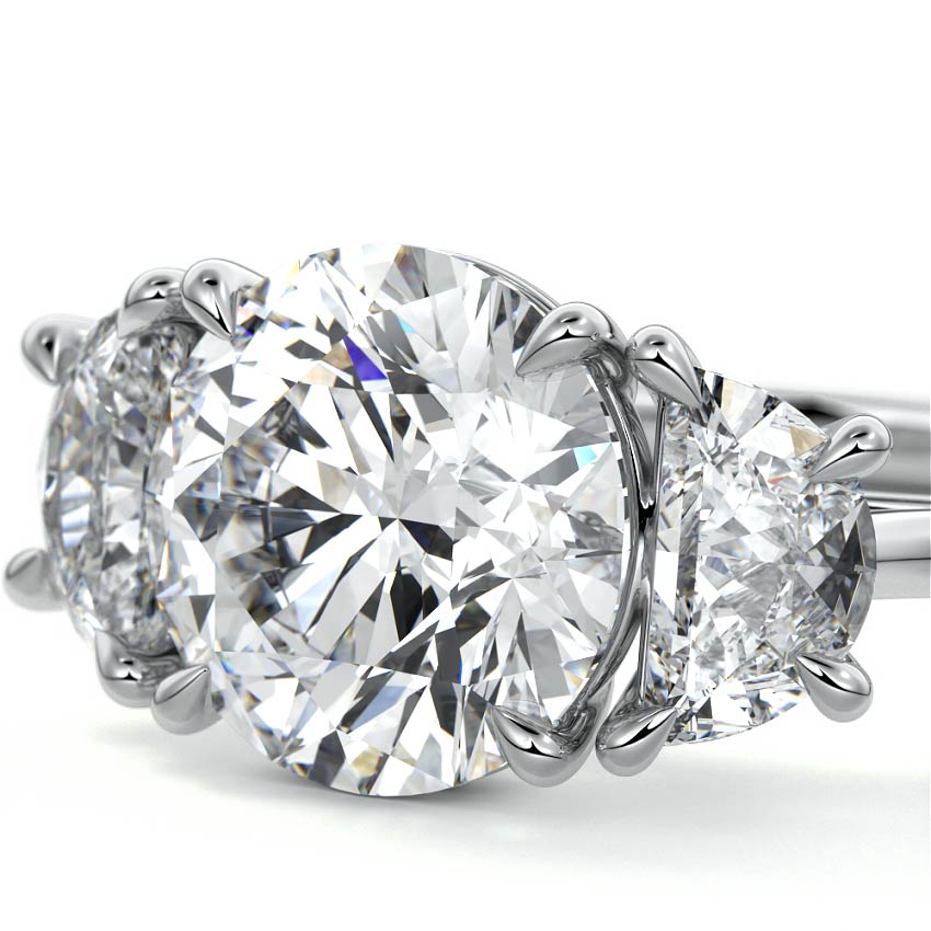 Platinum Three-Stone Round Diamond Ring with Half Moon Side Stones