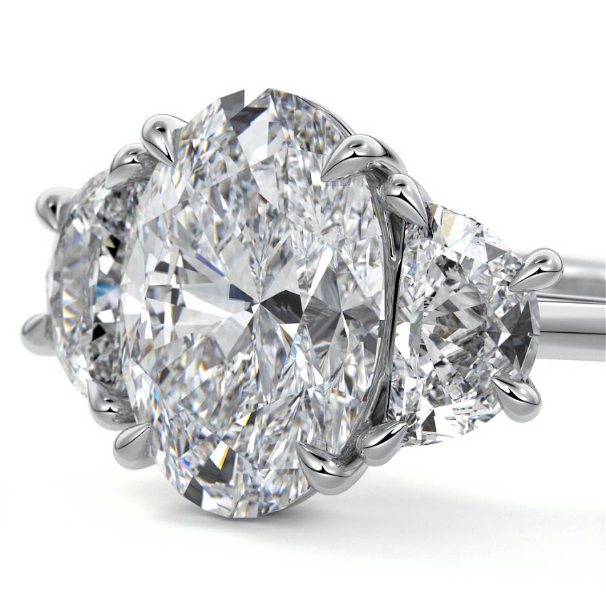 Platinum Three-Stone Oval Diamond Ring with Half Moon Side Stones