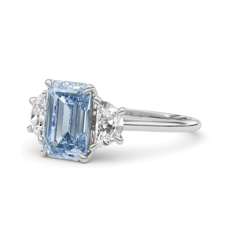 Platinum Three-Stone Fancy Blue Emerald Cut Diamond Ring with Half Moon Side Stones