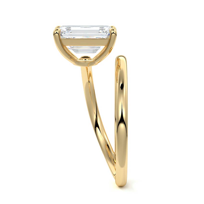 Yellow gold Emerald Solitaire Diamond Engagement Ring with Twisted Split Shank and Pave Band