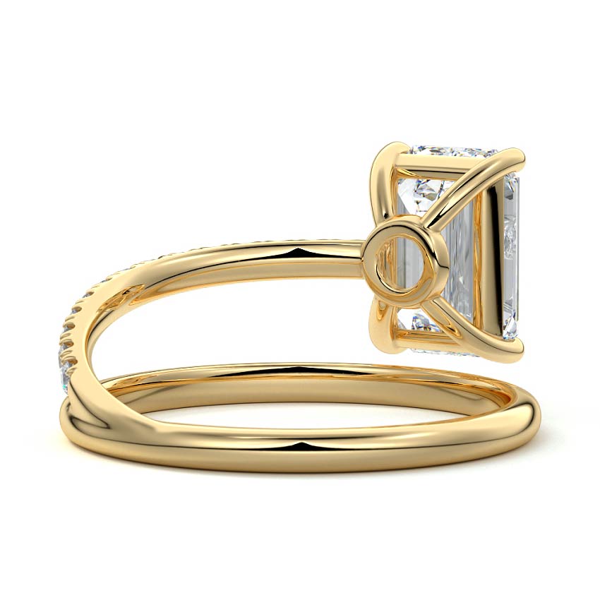 Yellow gold Emerald Solitaire Diamond Engagement Ring with Twisted Split Shank and Pave Band