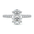 White gold Oval Diamond Engagement Ring with Pavé Band and Hidden Halo