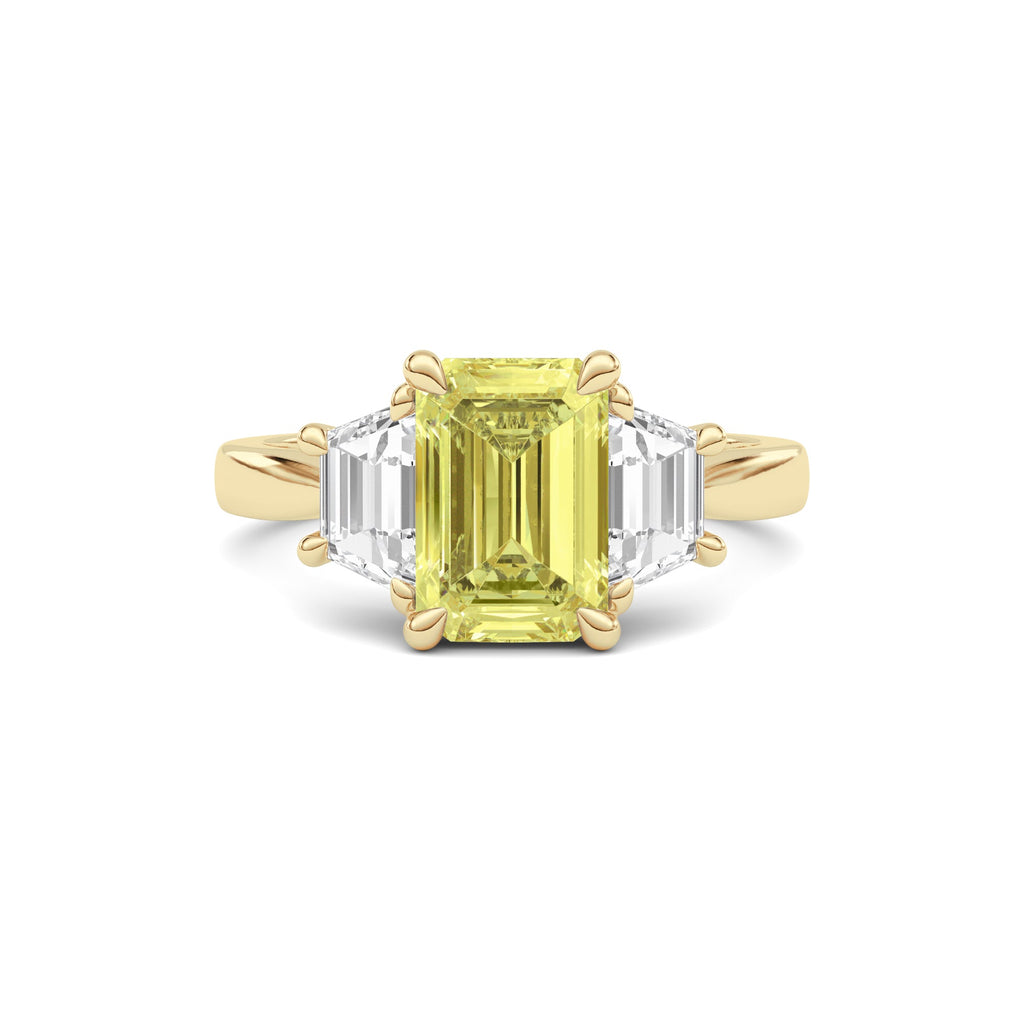 Yellow gold Three-Stone Fancy Yellow Emerald Cut Diamond Ring with Step-Cut Side Stones