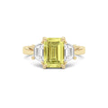 Yellow gold Three-Stone Fancy Yellow Emerald Cut Diamond Ring with Step-Cut Side Stones