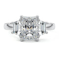 Platinum Three-Stone Radiant Diamond Ring with Step-Cut Side Stones