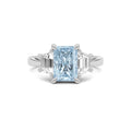 Platinum Three-Stone Fancy Blue Radiant Cut Diamond Ring with Step-Cut Side Stones