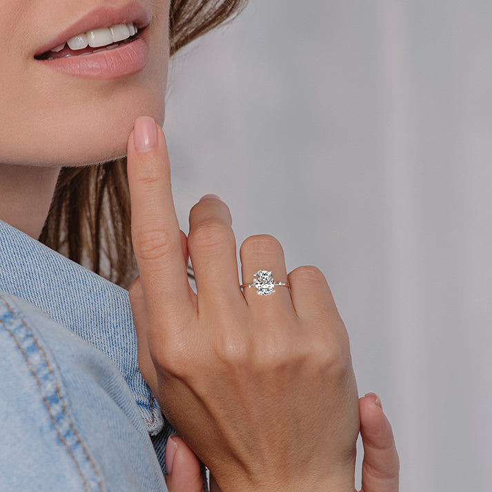 Silver Cushion Diamond Side Stone Engagement Ring