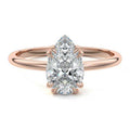 Rose gold Pear Diamond Solitaire Engagement Ring with Classic Basket Setting