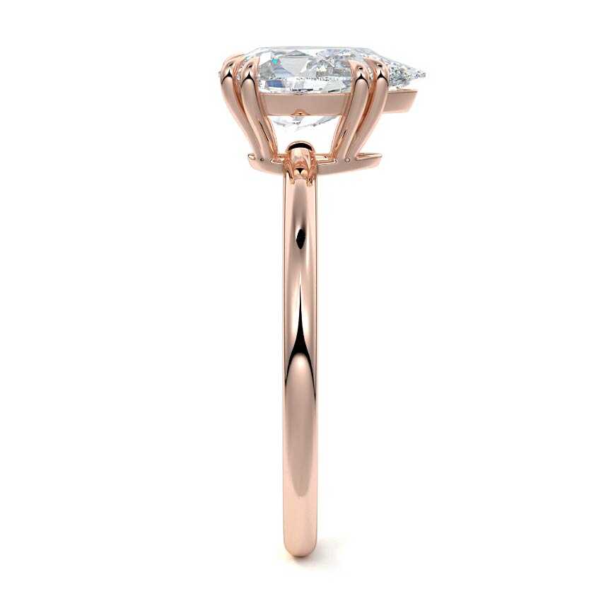Rose gold Pear Diamond Solitaire Engagement Ring with Classic Basket Setting