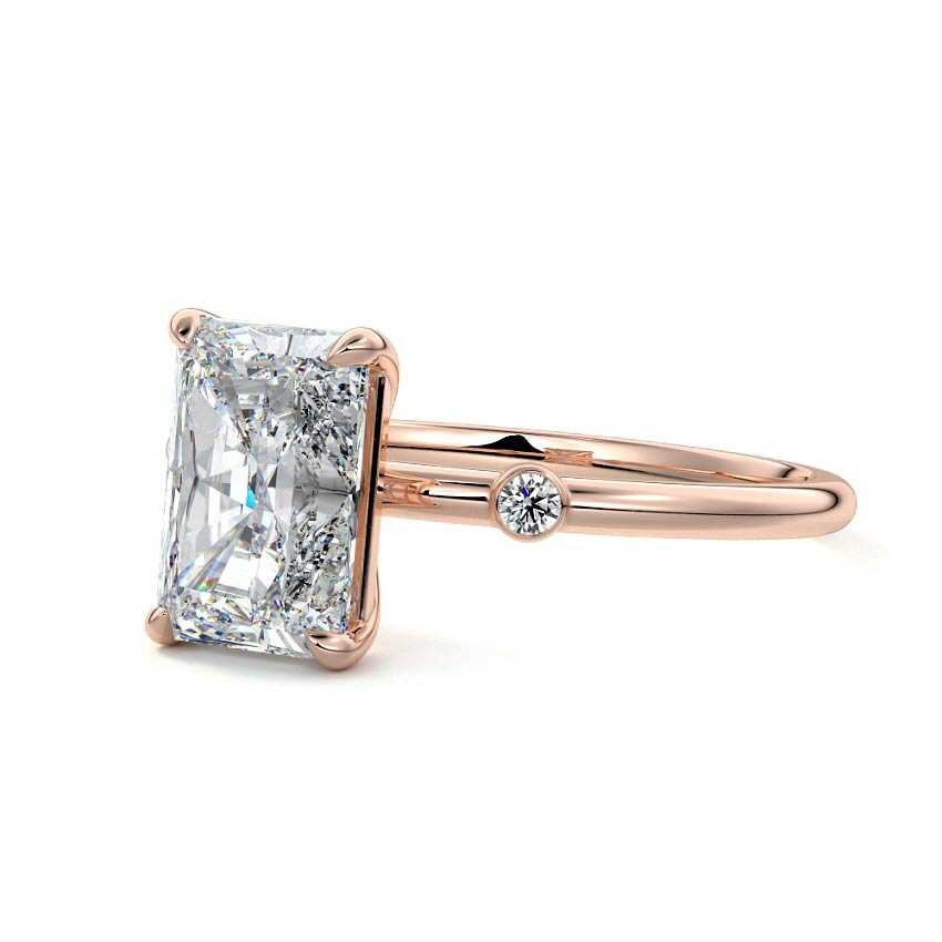 Rose gold Radiant Diamond Side Stone Ring with Round Accents