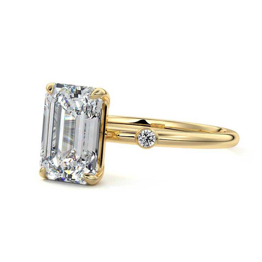 Yellow gold Emerald Diamond Side Stone Ring with Round Accents