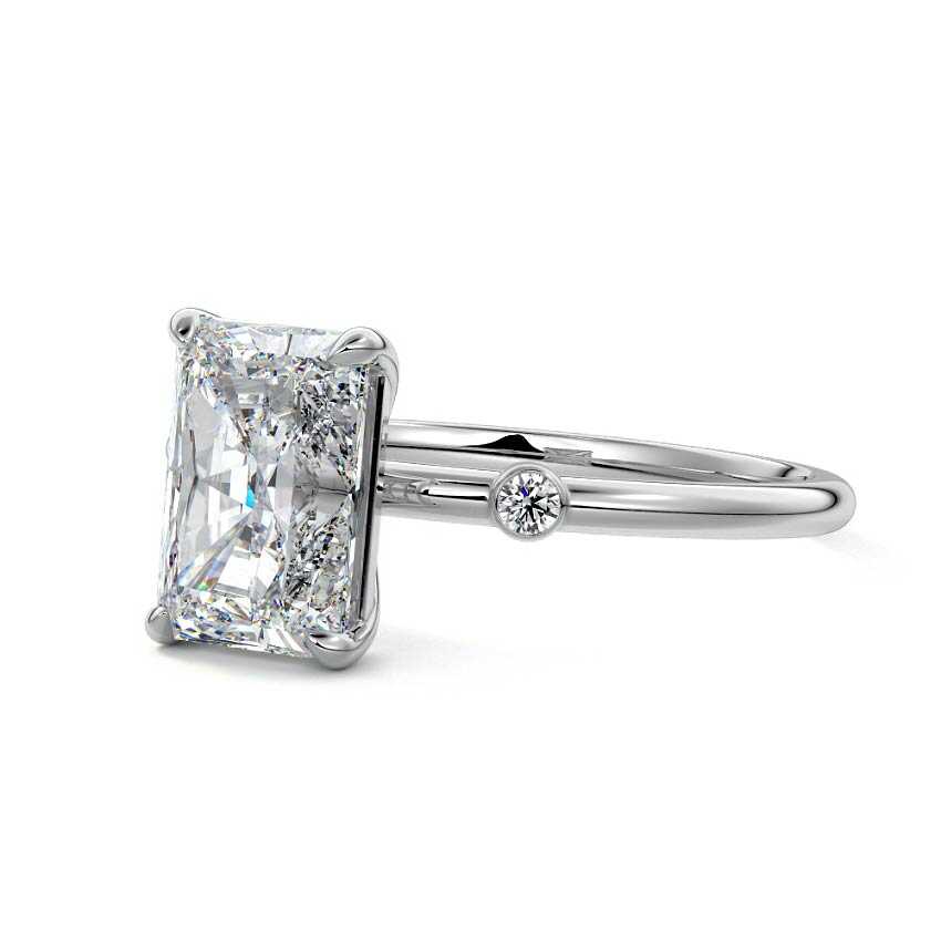 White gold Radiant Diamond Side Stone Ring with Round Accents