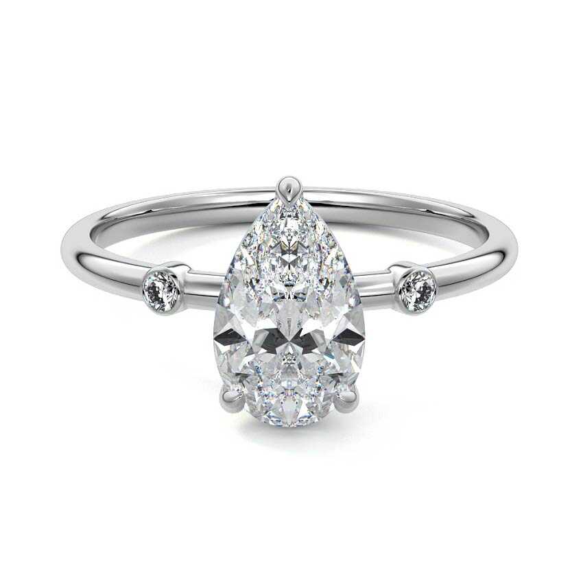 White gold Pear Diamond Side Stone Ring with Round Accents